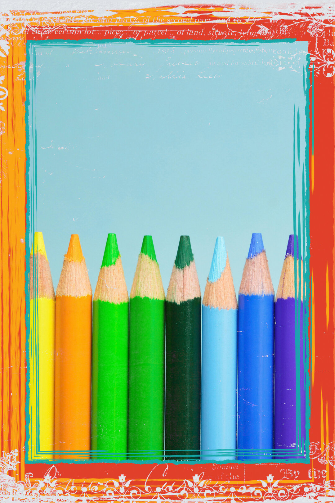 Colourful pencils laid out in a row.